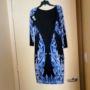 Fitting bodycon dress with 3/4 sleeves, midi skirt, Zippered back